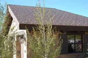 "I just had a synthetic shake/slate roof installed and my contractor didn't tell me I needed snow guards, why?"